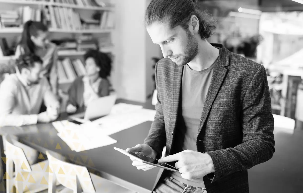 business man looking at ipad