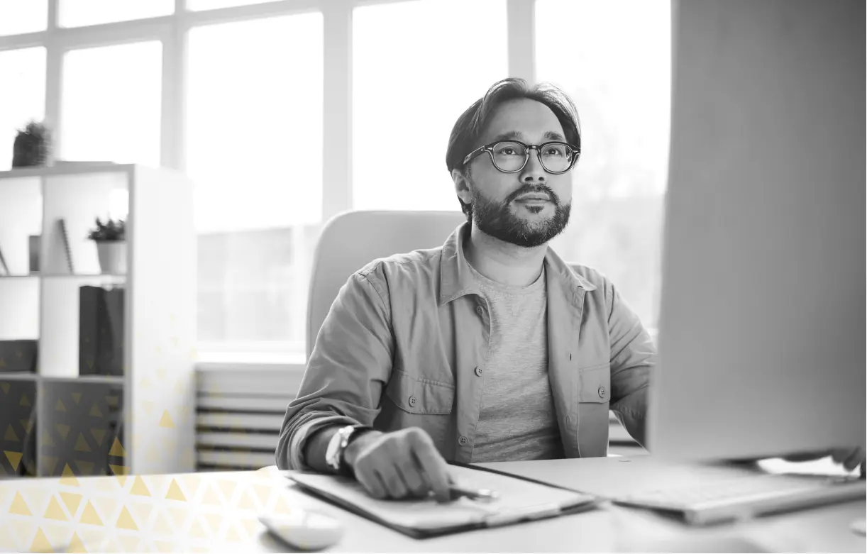 man looking intently at computer