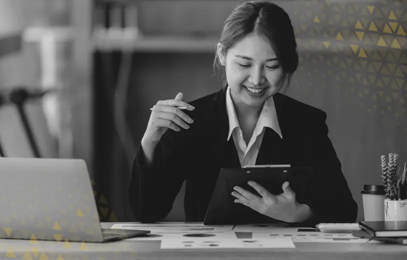 delighted woman looking at her phone